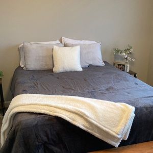 UGG queen size comforter set with decorative pillow and throw.